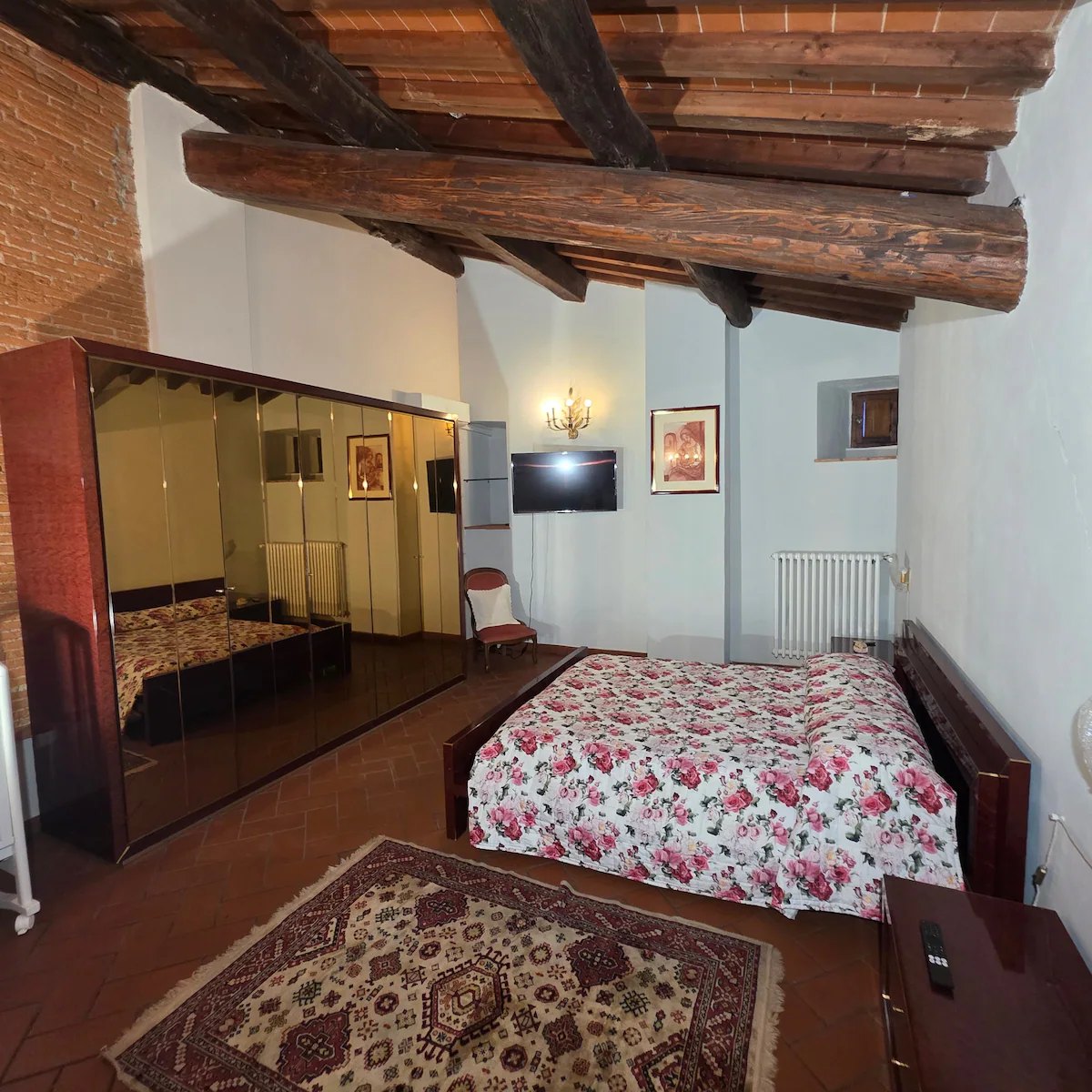 Podere Pagliaio 1 &mdash; Camera matrimoniale sotto il tetto in legno